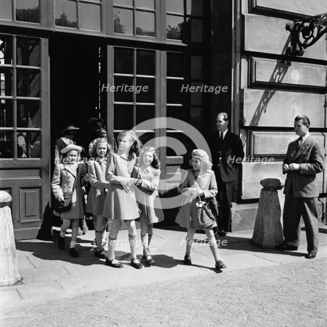 Princesses Birgitta, Margaretha and Desiree on their way from the Castle School, 24/5 1946. Creator: Unknown.