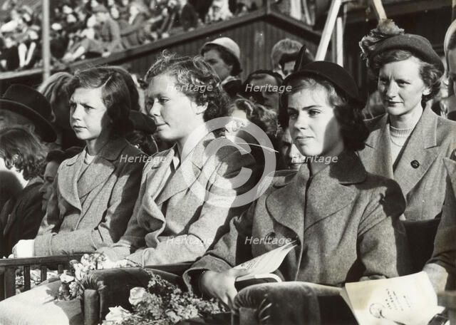 Princesses Desiree, Birgitta and Margaretha of Sweden at a dog show, Stockholm, 1950. Artist: Unknown