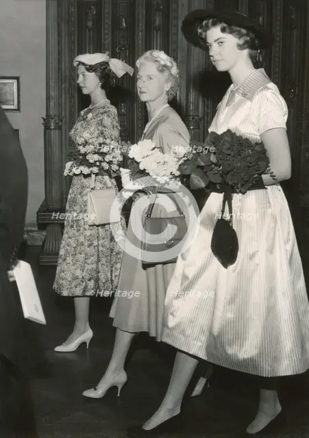 Princesses Margaretha, Sibylla and Desiree of Sweden on their way to a lunch, Stockholm, 1957. Creator: Unknown.