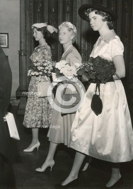 Princesses Margaretha, Sibylla and Desiree of Sweden on their way to a lunch, Stockholm, 1957. Creator: Unknown.
