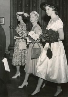 Princesses Margaretha, Sibylla and Desiree of Sweden on their way to a lunch, Stockholm, 1957. Creator: Unknown