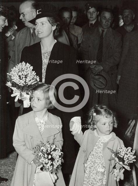 Princesses Sibylla, Margaretha and Birgitta of Sweden visiting a dog show, 1 June 1940.  Creator: Karl Sandels.