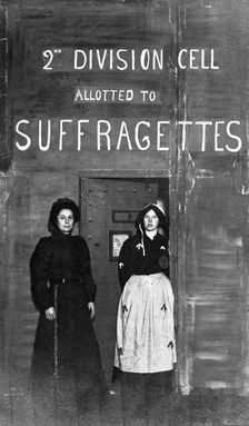 Prison officer with a suffragette prisoner, c1910. Creator: Unknown