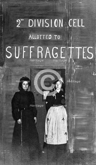 Prison officer with a suffragette prisoner, c1910. Creator: Unknown.
