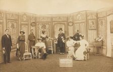 Prisoners of war, some in drag, posing on stage in Miquette et sa mere at..., (1910-1919?). Creator: Unknown