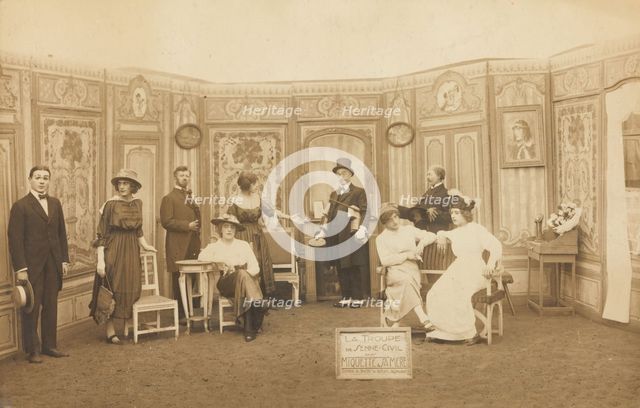 Prisoners of war, some in drag, posing on stage in 'Miquette et sa mere' at..., (1910-1919?). Creator: Unknown.