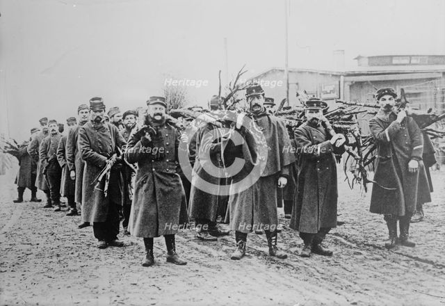 Prisoners, bringing in wood, Zossen, between 1914 and c1915. Creator: Bain News Service.