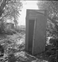 Privy in cotton camp for migratory workers, California, 1936. Creator: Dorothea Lange