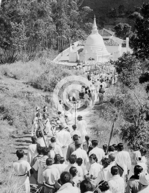 Procession to a Buddhist temple, Diyatalawa, Ceylon, c1945. Artist: Unknown