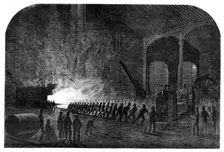 Process of rolling armour-plates for Her Majesty's ships at the Atlas Steelworks, Sheffield, 1861. Creator: Mason Jackson