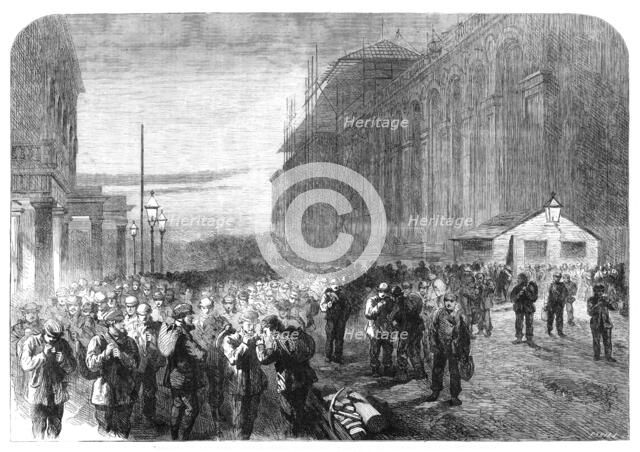 Progress of the Great International Exhibition building: the workmen leaving the grounds, 1861. Creator: Frederick John Skill.