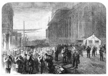 Progress of the Great International Exhibition building: the workmen leaving the grounds, 1861. Creator: Frederick John Skill