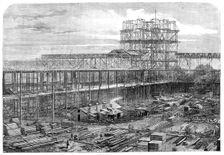 Progress of the International Exhibition building: works of the Nave, Eastern Transept..., 1861. Creator: T. Bolton