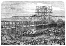 Progress of the International Exhibition building: works of the Nave, Eastern Transept..., 1861. Creator: T. Bolton