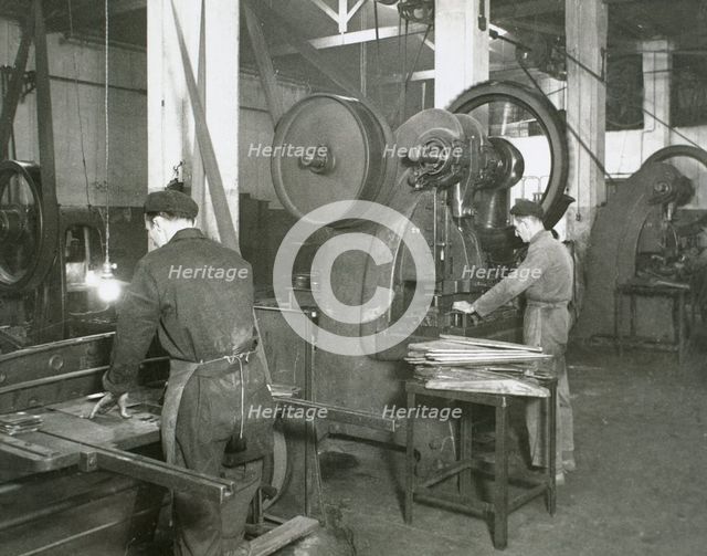 Production line of a company who manufacture motorcycle components, Barcelona, Spain, 1945.  Creator: Unknown.