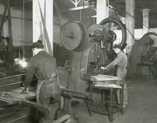 Production line of a company who manufacture motorcycle components, Barcelona, Spain, 1945. Creator: Unknown