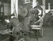 Production line of a company who manufacture motorcycle components, Barcelona, Spain, 1945. Creator: Unknown