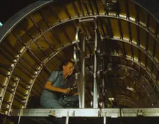 Production of B-24 bombers and C-87 transports, Consolidated Aircraft Corp., Fort Worth, Texas, 1942 Creator: Howard Hollem