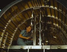 Production of B-24 bombers and C-87 transports, Consolidated Aircraft Corp., Fort Worth, Texas, 1942 Creator: Howard Hollem