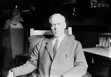 Prof. Jeremiah W. Jenks seated in study, 1912. Creator: Bain News Service