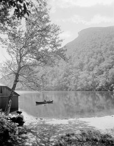 Profile Lake and Old Man of the Mountain, White Mts., N.H., between 1900 and 1920. Creator: Unknown
