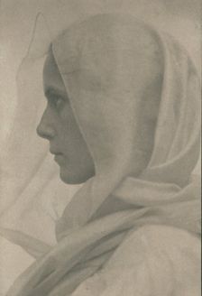 Profile portrait of woman draped with a veil, c1900. Creator: Amelia Van Buren
