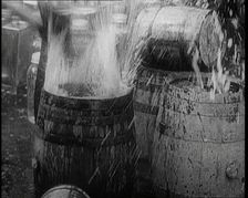 Prohibition Scenes in the United States of America. Barrels of Alcoholic Beverages Being..., 1920. Creator: British Pathe Ltd