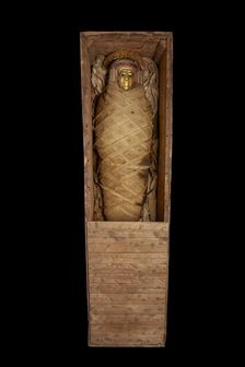 Ptolemaic coffin, mummy with gilt mask and floral garlands, Roman Period (Egypt), c30BC-AD641