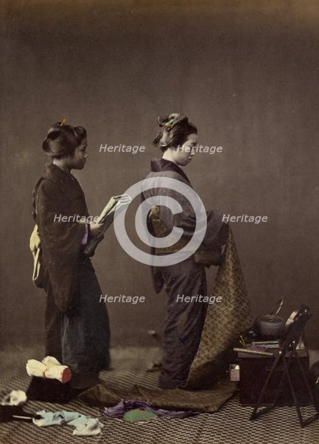 Putting on the Obi, or Girdle, 1866-1867. Creator: Felice Beato.