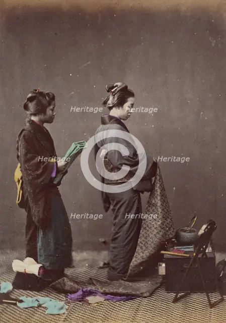 Putting on the Obi or Girdle, 1868. Creator: Felice Beato.
