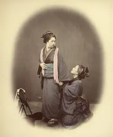 Putting on the Obi, or Gridle, 1866-1867. Creator: Felice Beato