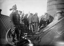 Putting out fire in Bain News Service Bldg. 1/6/12, 1912. Creator: Bain News Service