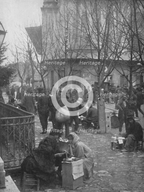'Public Letter-writers in a Constantinople Street', 1913. Artist: Unknown.