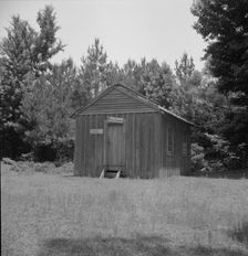 Public library in the southwestern section of Mississippi, in the piney woods, 1937. Creator: Dorothea Lange