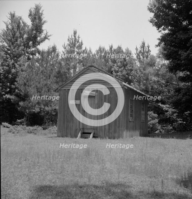 Public library in the southwestern section of Mississippi, in the piney woods, 1937. Creator: Dorothea Lange.