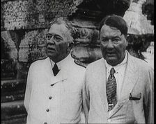 Publisher Alfred Harmsworth, 1st Viscount Northcliffe, Talking to Another Man by a Ruin, 1922. Creator: British Pathe Ltd
