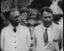 Publisher Alfred Harmsworth, 1st Viscount Northcliffe, Talking to Another Man by a Ruin, 1922. Creator: British Pathe Ltd