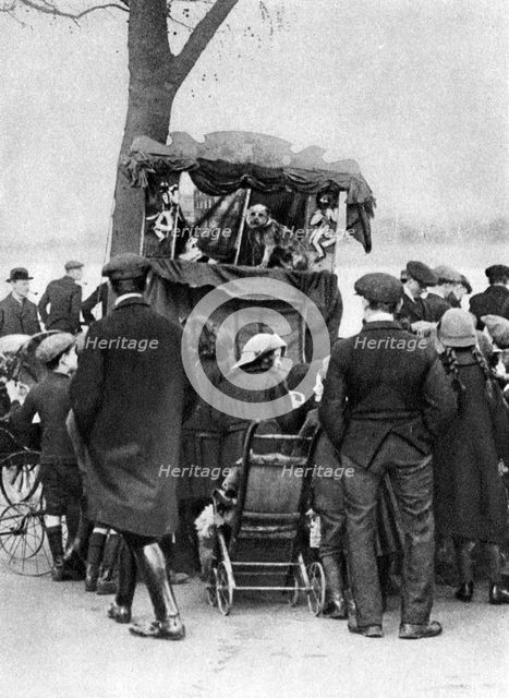 Punch and Judy show in Putney, London, 1926-1927. Artist: Unknown