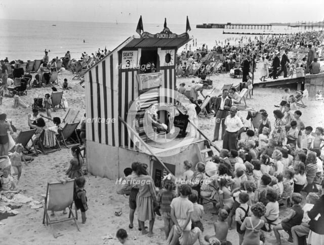 Punch and Judy show, Lowestoft, Suffolk, August 1949. Artist: Hallam Ashley