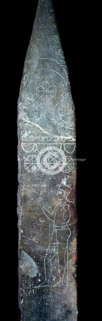 Punic stela of a priest holding a child. Artist: Unknown