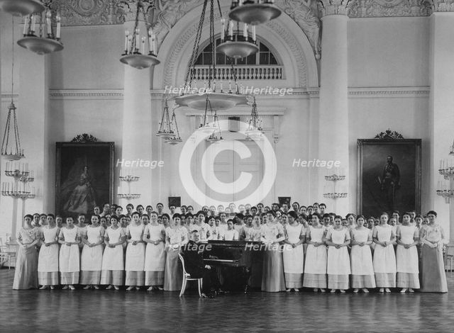 Pupils of the Smolny Institute for Noble Maidens at a Music Lesson, c. 1913. Artist: Bulla, Karl Karlovich (1853-1929)