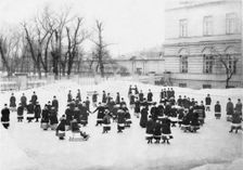 Pupils of the Smolny Institute for Noble Maidens at at Winter Walk, c. 1913. Artist: Bulla, Karl Karlovich (1853-1929)