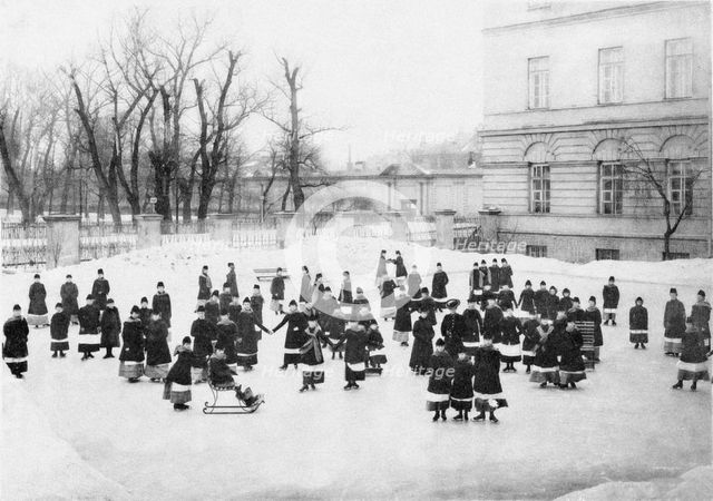 Pupils of the Smolny Institute for Noble Maidens at at Winter Walk, c. 1913. Artist: Bulla, Karl Karlovich (1853-1929)