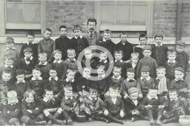 Pupils and their teacher, Elizabeth Street School, Woolwich, 1894. Artist: Unknown.