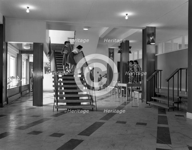Pupils talking on a stairway, Tapton Hall Secondary Modern School, Sheffield, South Yorkshire, 1960. Creator: Michael Walters.