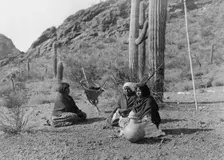 Qahatika women resting in Harvest Field-Qahatika, c1907. Creator: Edward Sheriff Curtis