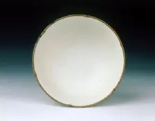 Qingbai bowl with pomegranate design, Yuan dynasty, China, early 14th century. Creator: Unknown