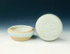 Qingbai box with moulded peonies, Yuan dynasty, China, 1279-1368. Creator: Unknown