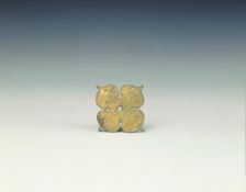 Quadrafoil applique with prancing horned sheep, Han dynasty, China, 206 BC-220 AD. Creator: Unknown