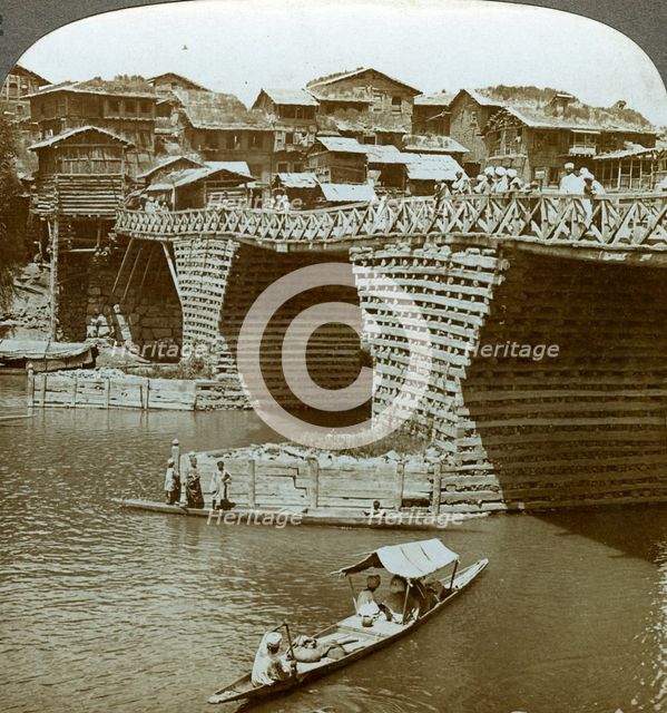 Quaint bridge and houses, City of Sun, Kashmir, India, c1900s(?).Artist: Underwood & Underwood